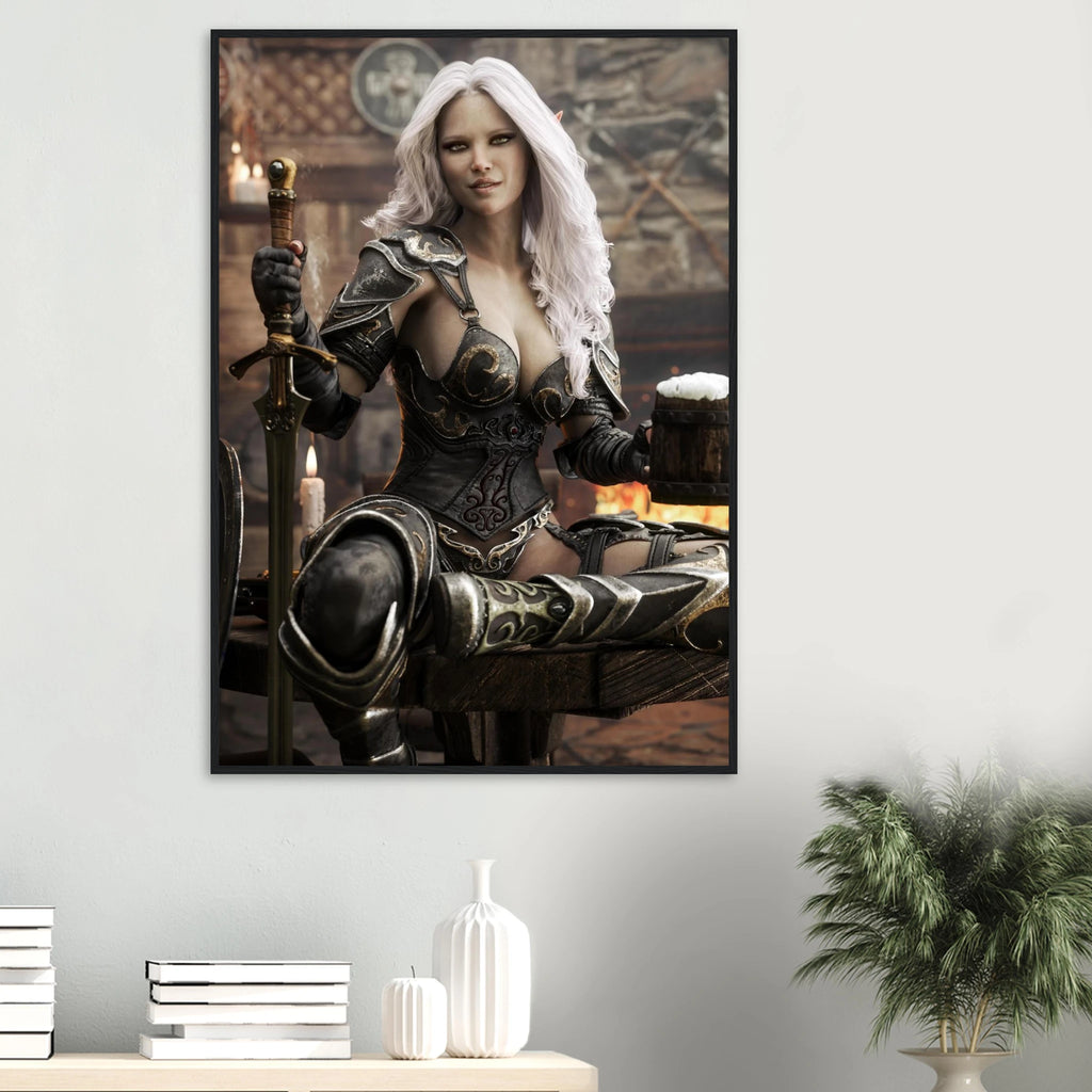 A framed vertical wall art print showing a fantasy warrior woman with long white hair, seated in dark armor and holding a sword, displayed on a light gray wall above a console table with books, vases, and a potted plant.